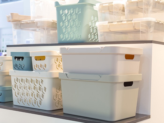 Organize essentials in bins